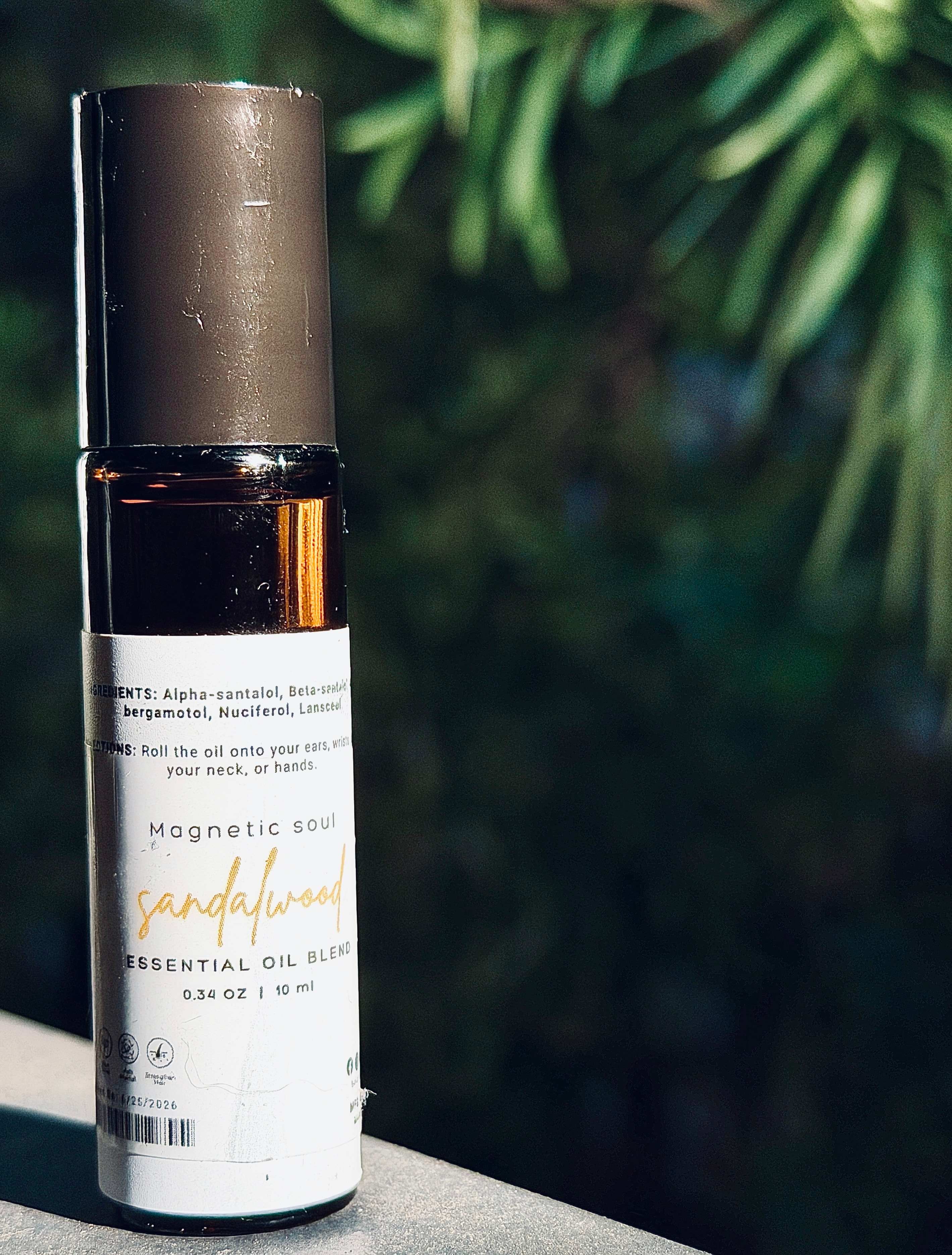 Sandalwood essential oil roll-on bottle